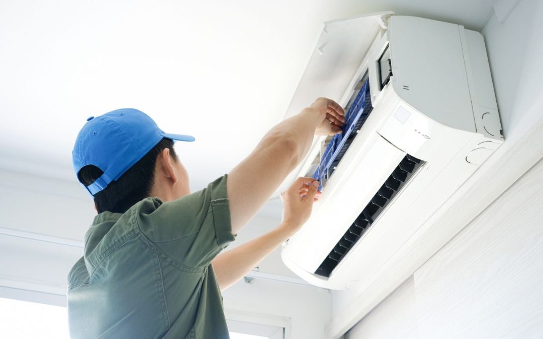 HVAC technician servicing a ductless mini split in Port Hueneme
