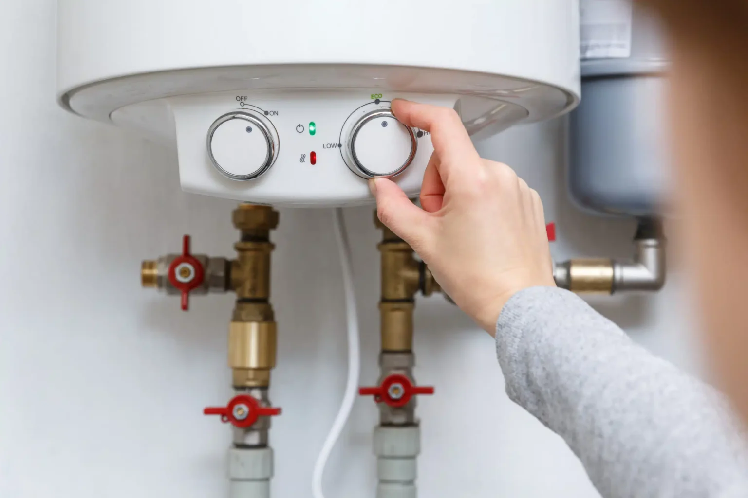 Technician adjusting a water heater in Port Hueneme